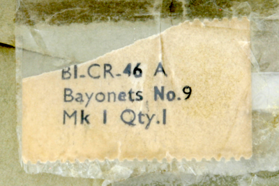 Image of British No. 9 Mk. I bayonet in wrapper with hard wax coating