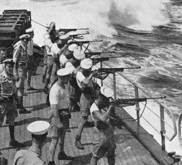 Dutch sailors conducting shipboard target practice with Johnson Model 1941 rifles and light machine gun