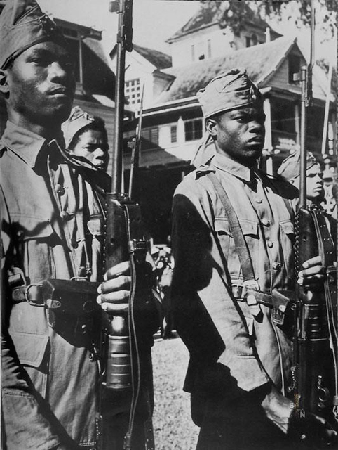 Image of local militia in Surinam armed with the Johnson Model 1941 rifle.