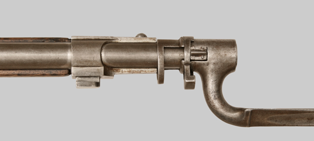 Close-up image of Uruguayan Mauser M1871 Socket Bayonet mounted to Mauer rifle.