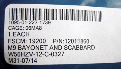 Image of Tri-Technologies Inc. Contract W56HZV-12-C-0327 M9 Bayonet Label.