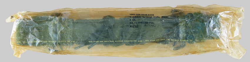 Pair of Viz Manufacturing Co. M8A1 scabbards sealed in the 1963-dated cellophane factory wrapper.