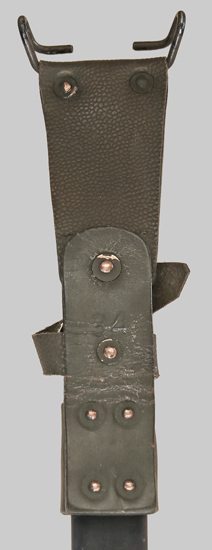 Image of Belgian FN Model 1949 in unique green leather belt frog.