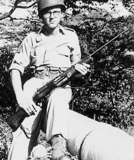Image of Dutch soldier in Curacao, armed with the Johnson Model 1941 rifle